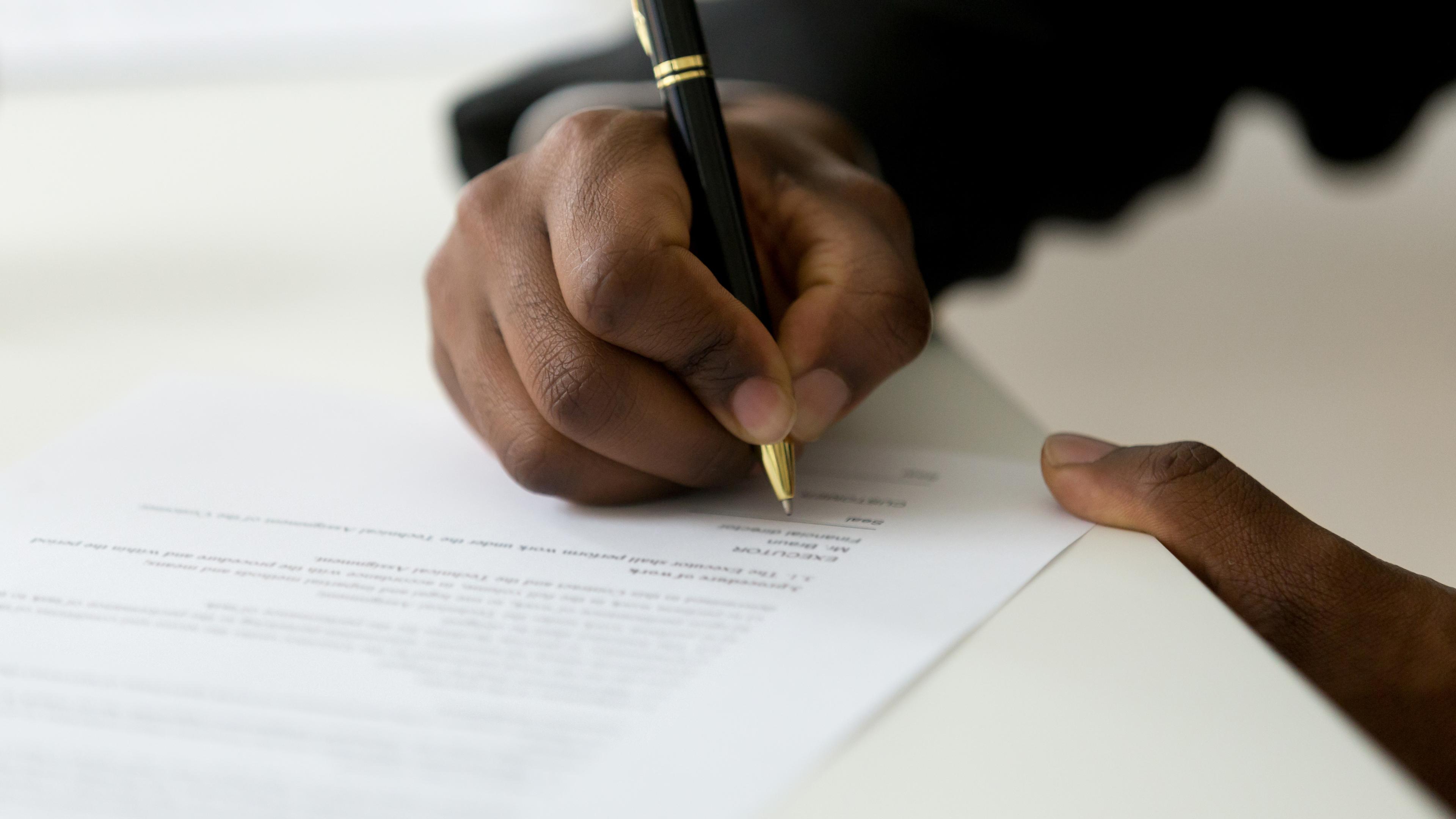 Person signing a contract