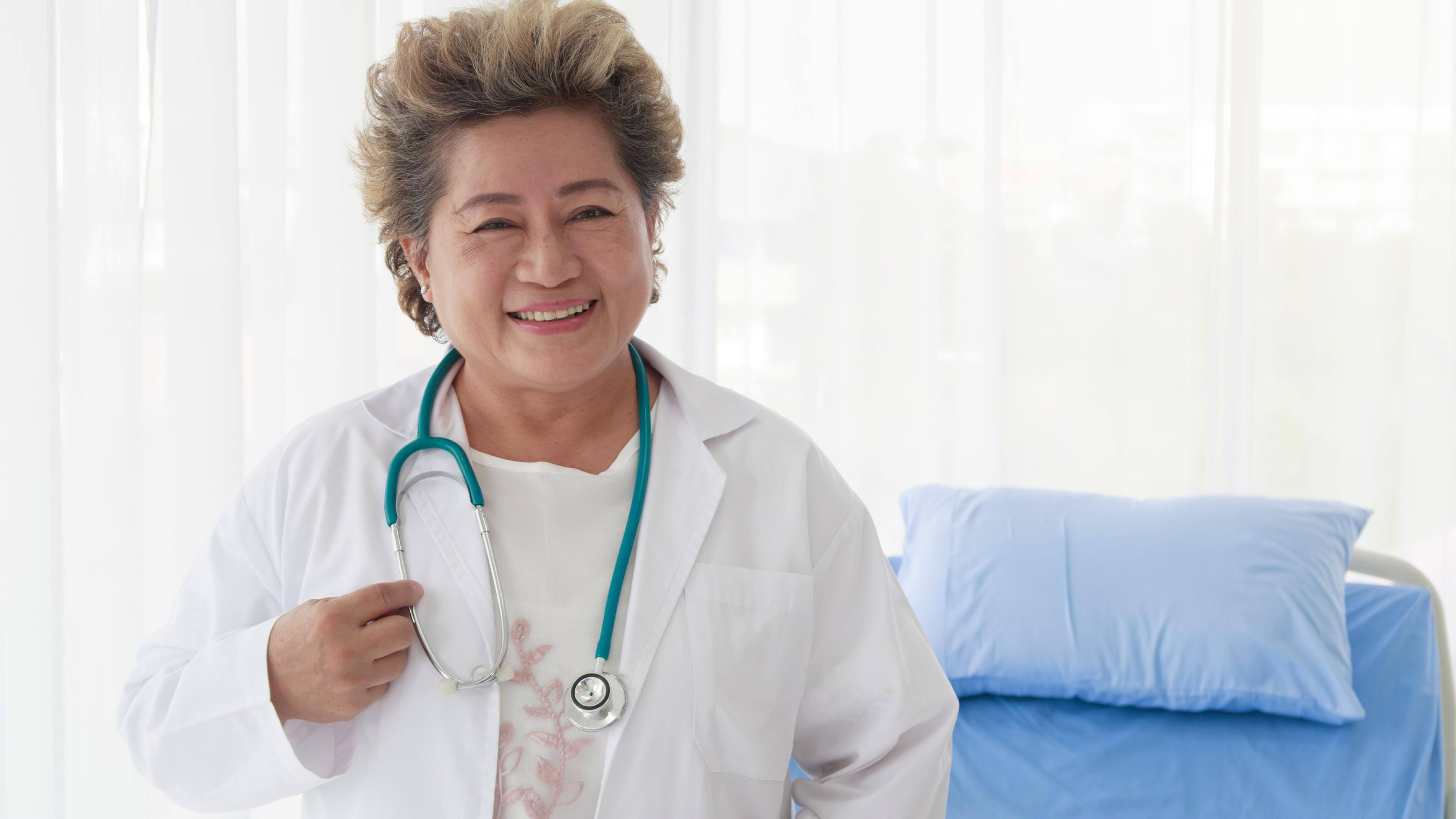 Older female doctor with stethoscope 