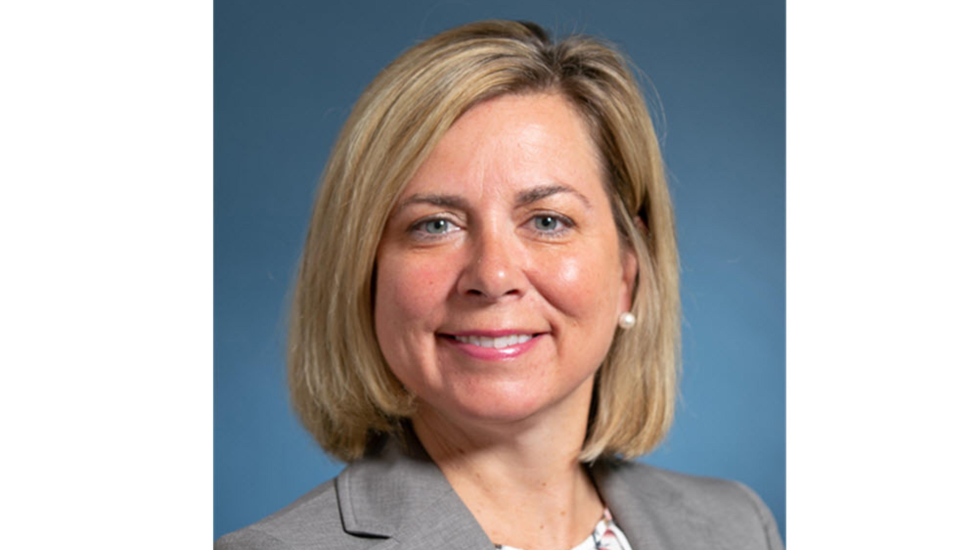 Sarah Latorre, President of Mass Advantage, on a blue background.