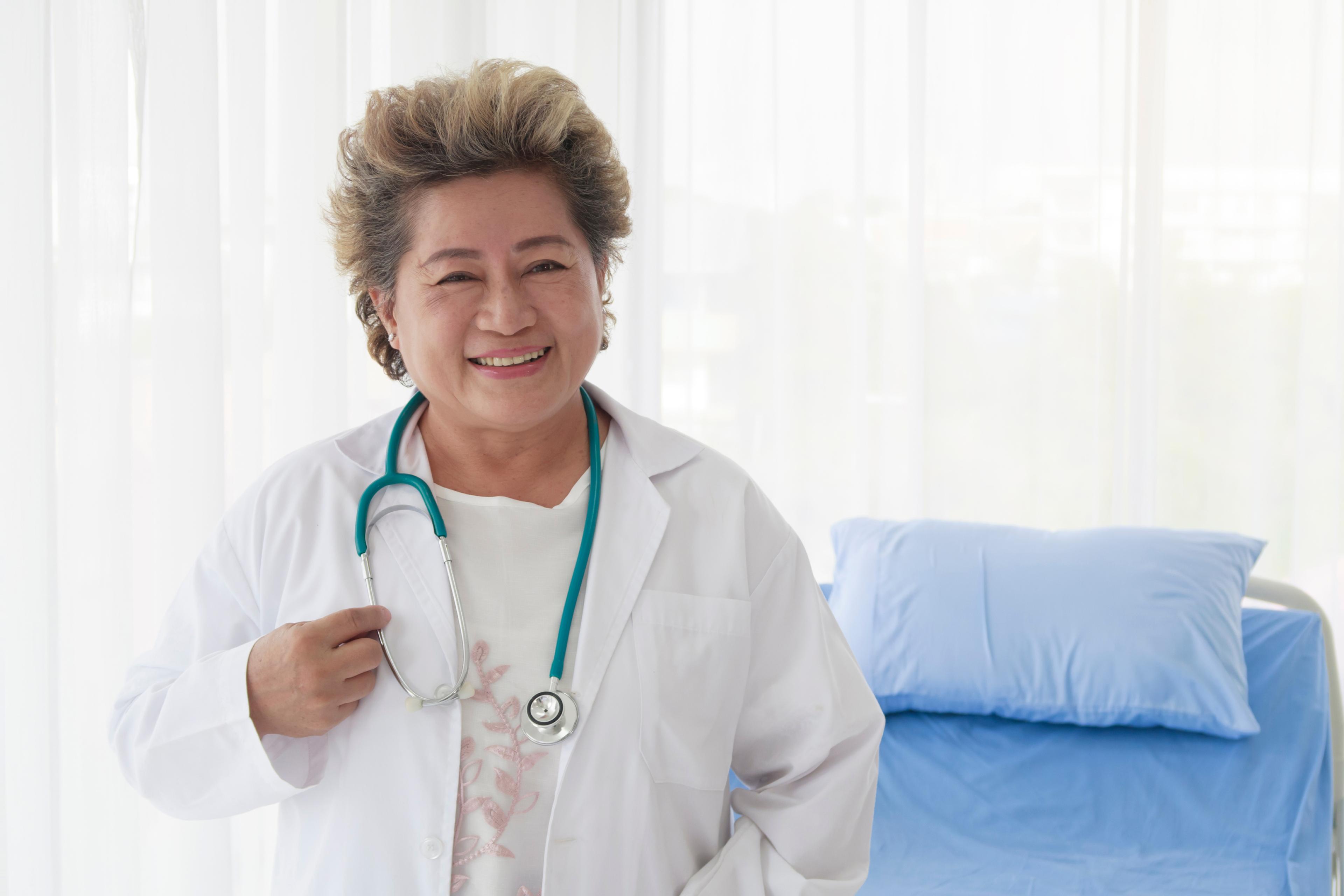 Older female doctor with stethoscope 