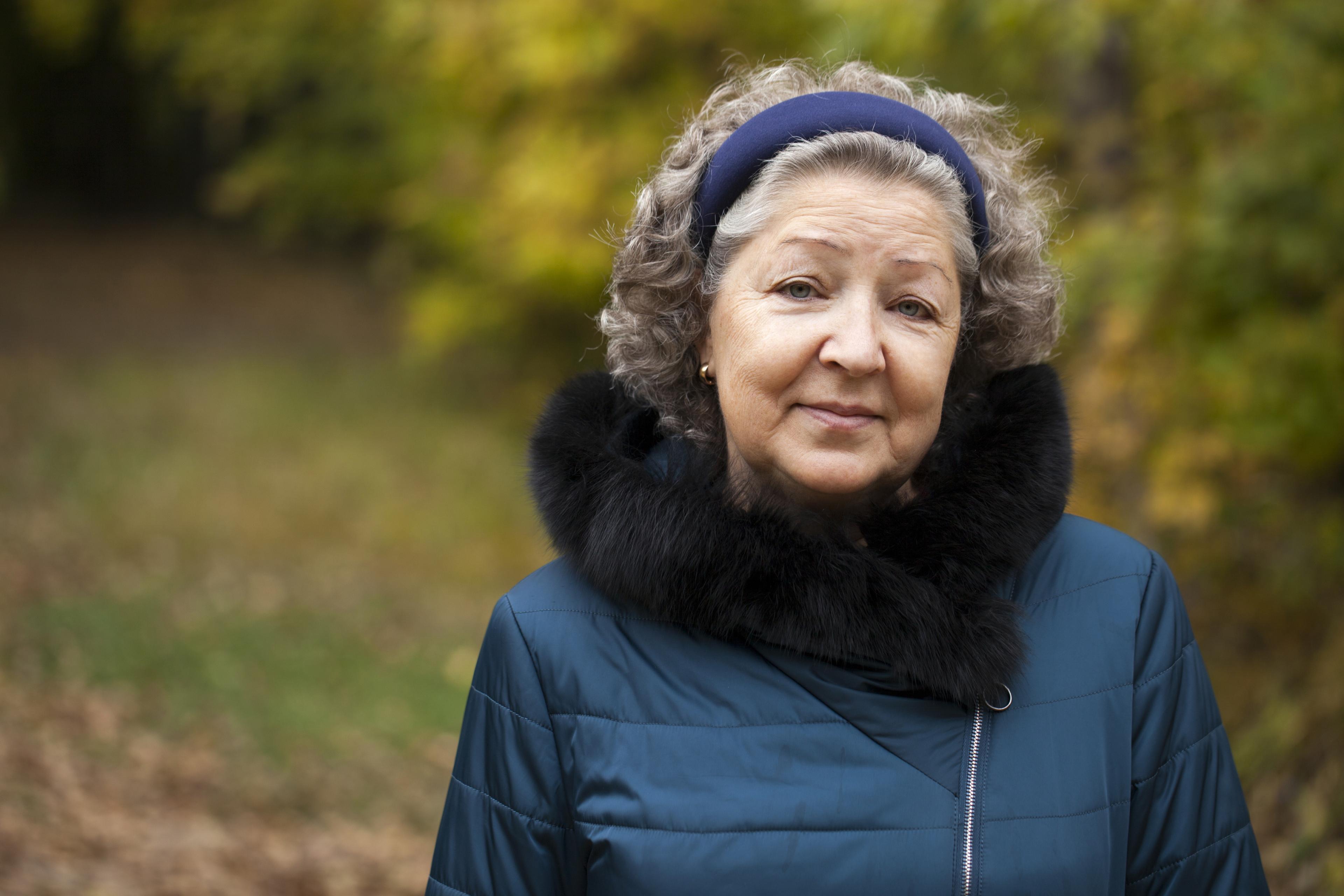 Woman in scarf outside