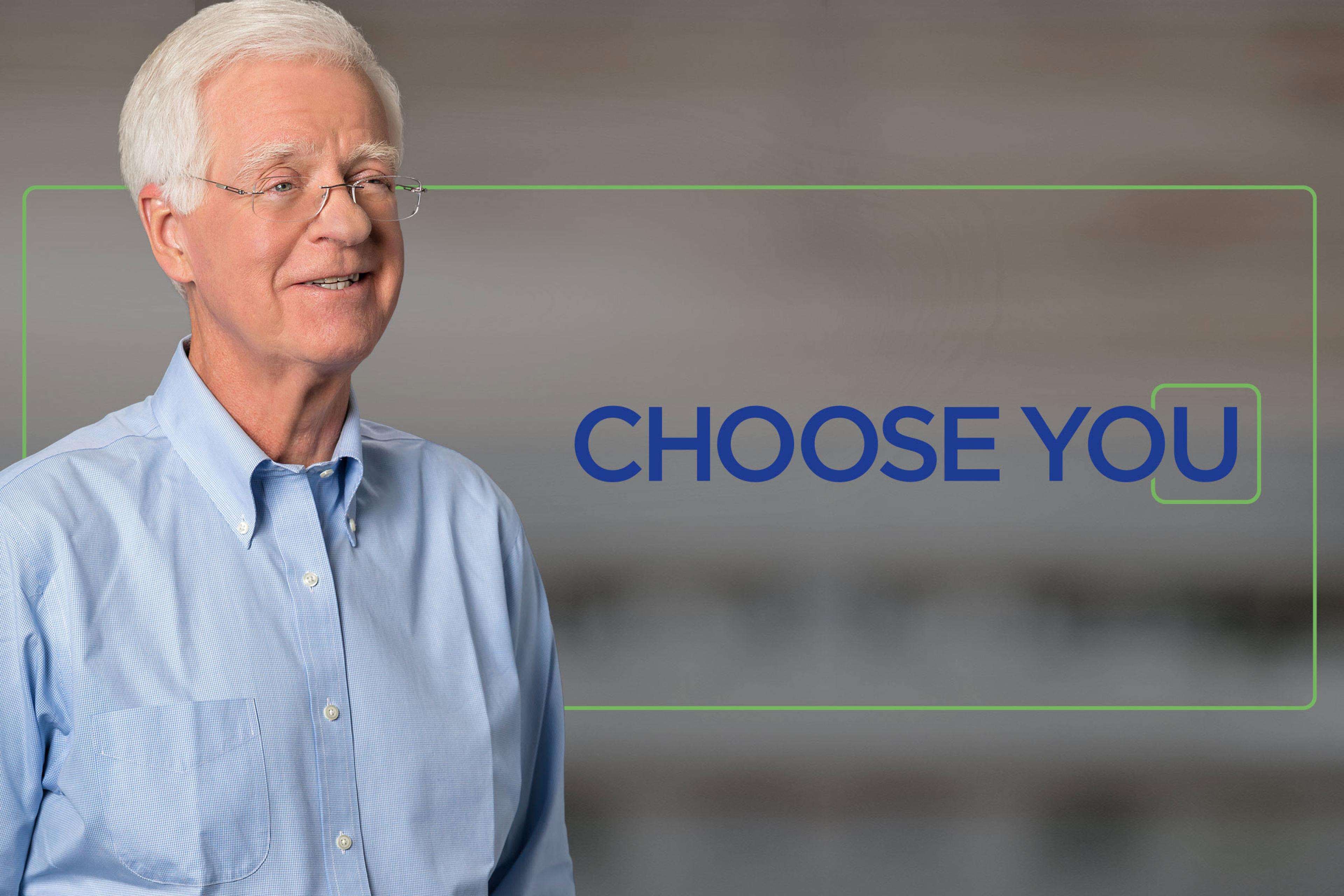 An older man in a blue shirt is next to text that reads Choose You